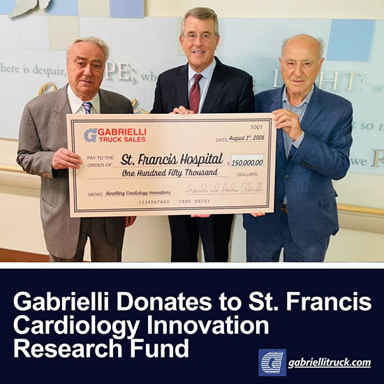 3 people together for $150,000 check donation presentation at St. Francis Hospital